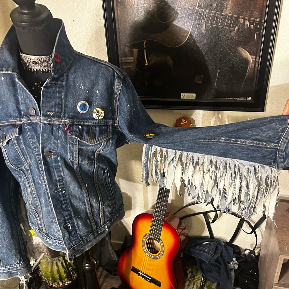 Levi’s men’s custom upcycled denim trucker jacket with denim fringe .